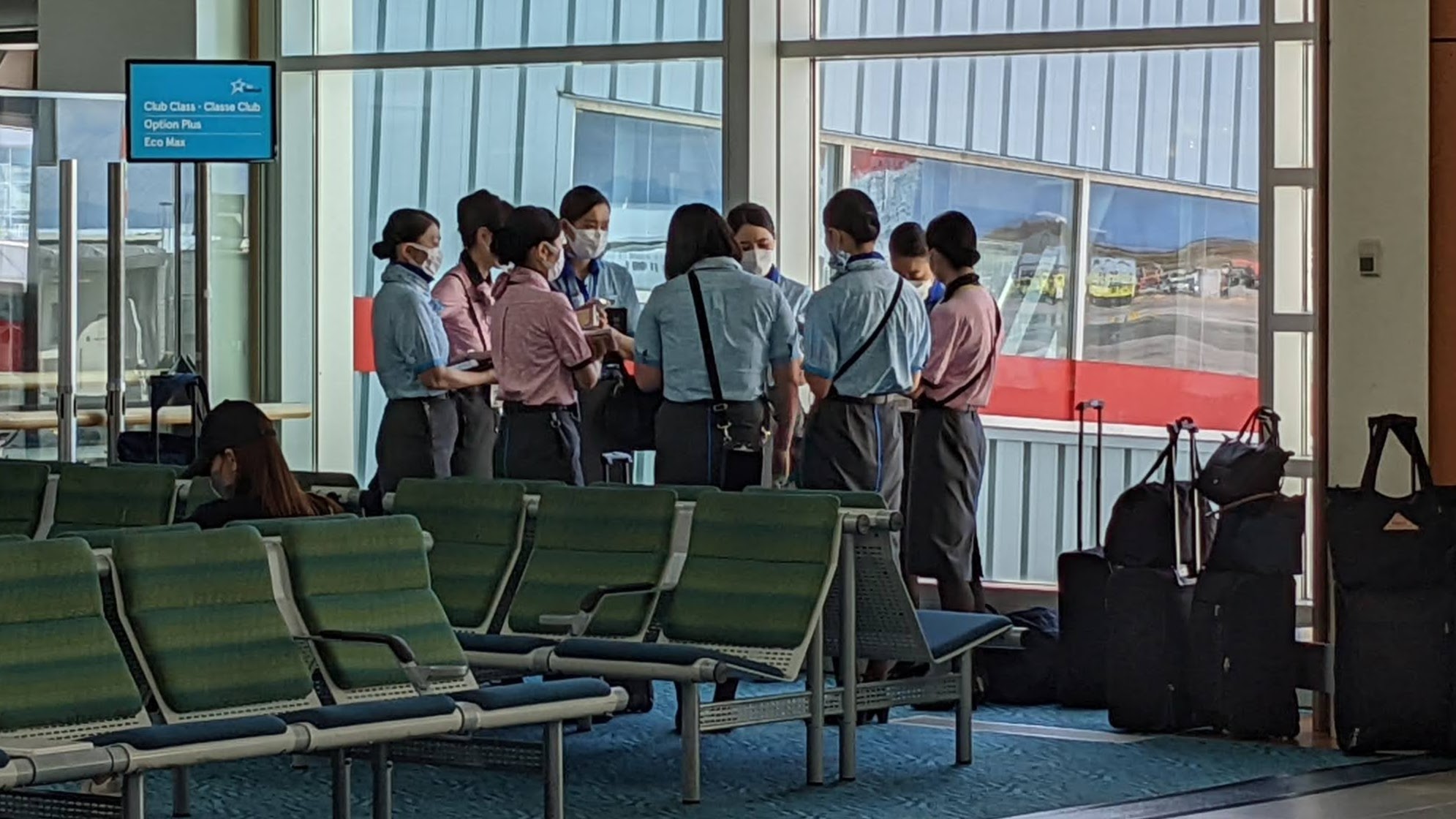 A preflight huddle for crew members